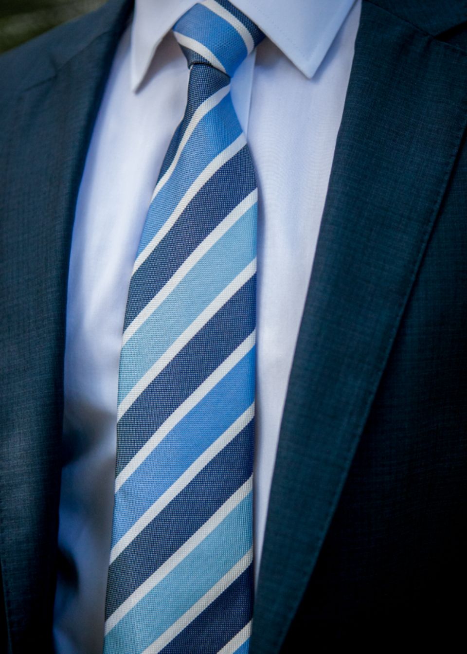 Close-up of a suit jacket and tie
